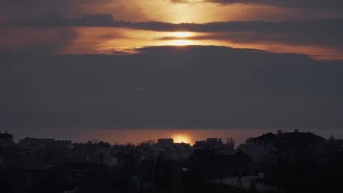 Nice sunrise among the clouds over the sea Stock Footage 107070872