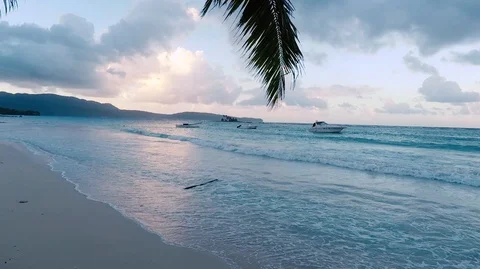 Nice sunset in Caribbean see with palms Stock Footage 127372352