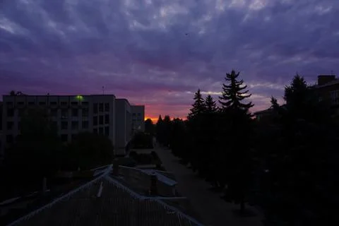 Nice sunset with clouds, in orange and purple shades Stock Photos