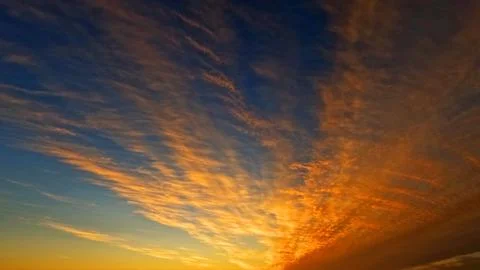 Nice sunset golden clouds on the sky background - photo of nature Stock Photos