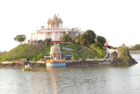 Nice temple surrounded by lake Stock Photos