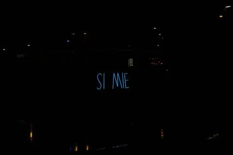 Nice text si mie glowing during night time Stock Photos