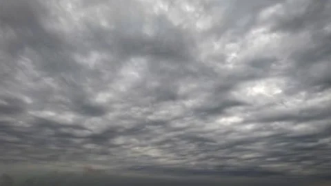 Nice timelapse clip with massive grey rain clouds - loop video Stock Footage 257521975