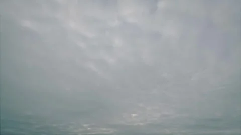 Nice timelapse of the sky with massive grey rain clouds - loop video Stock Footage 273842666