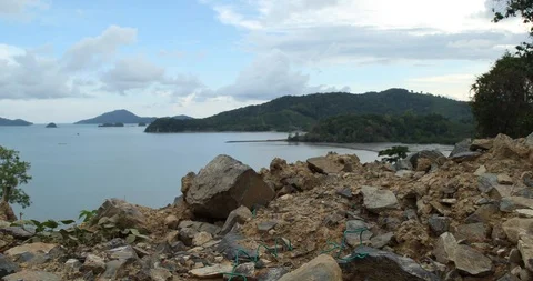Nice tracking shot over the rocks on the mountain towards to Langkawi Sea Stock Footage 101491054