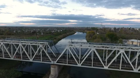 Nice view from the height on the railroad bridge, shooting a drone flying over 스톡 동영상 68774642