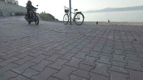 Nice View of Motorcycle Crossing Road Stock Footage 310945926