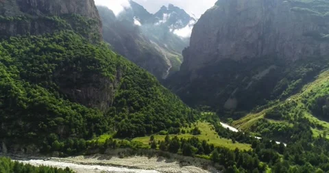Nice view of the mountain gorge and the river between high rocks Stock Footage 147102716