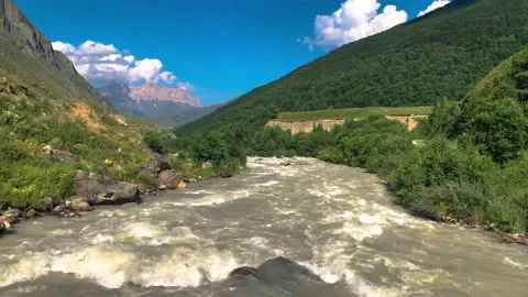 Nice view of the mountain river in the picturesque gorge of the Caucasus. Stock Footage 158397527