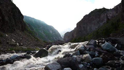 Nice view of the mountain river in the picturesque gorge of the Caucasus. Stock Footage 158820945