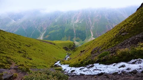 Nice view of the mountain river in the picturesque gorge of the Caucasus. Stock Footage 158821047