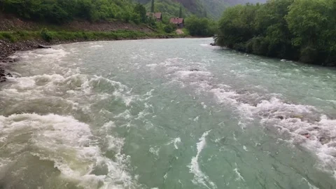 Nice view of the mountain river in the picturesque gorge of the Caucasus. Stock Footage 159570649