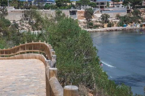Nice view on pathway of beach of Cabo Roig and coastline of Dehesa de Campoam Stock Photos
