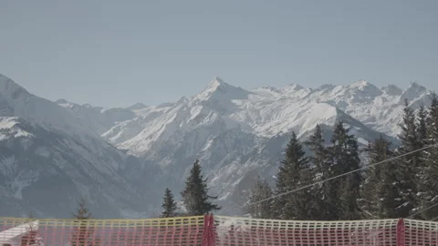 Nice view of snow covered mountains and some trees Stock Footage 264106142