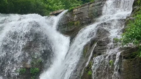 Nice view of the waterfall in the mountains of the North Caucasus. Stock Footage 157723063