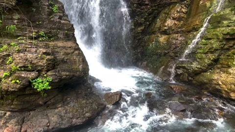 Nice view of the waterfall in the mountains of the North Caucasus. Stock Footage 157724389