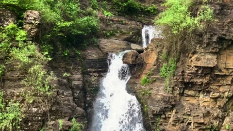 Nice view of the waterfall in the mountains of the North Caucasus. Stock Footage 157724947