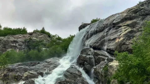 Nice view of the waterfall in the mountains of the North Caucasus. Stock Footage 157725873