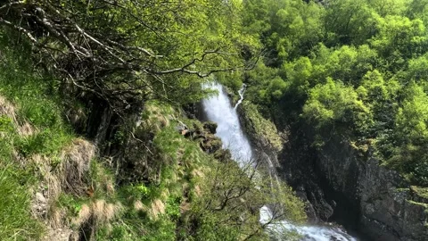 Nice view of the waterfall in the mountains of the North Caucasus. Stock Footage 157730915