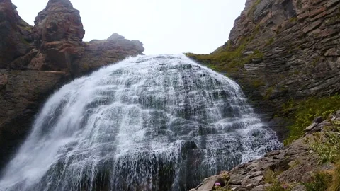 Nice view of the waterfall in the mountains of the North Caucasus. Stock Footage 158821075