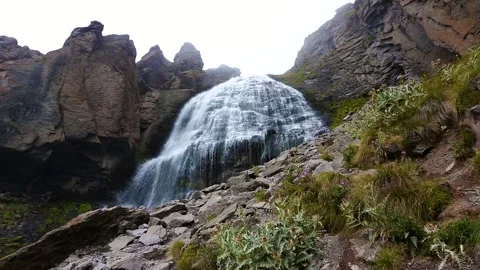 Nice view of the waterfall in the mountains of the North Caucasus. Stock Footage 158821126