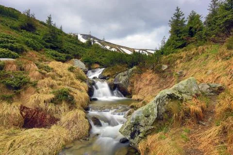 Nice waterfall in mountains Stock Photos