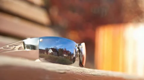 Nice Weather cloudy Sky Timelapse reflected in Glasses Stock Footage 11018051
