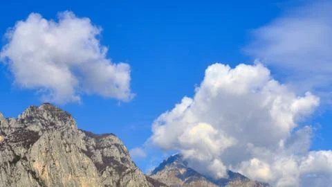 Nice white clouds over Malgrate small town near Lecco Stock Photos