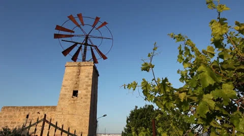 Nice wide shot on a antique wind mill on Malloca Stock Footage 24697710