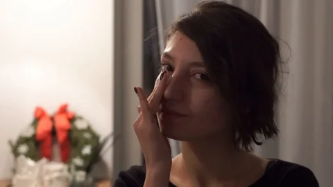 Nice woman using mask for face Stock Footage 100997783