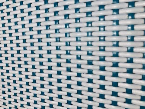 Nice woven pattern of white and dark green plastic strings Stock Photos