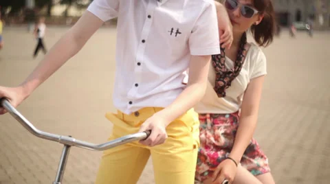 Nice young couple of model on vintage bike Stock Footage 28674774