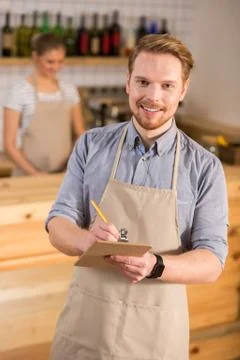 Nice young man taking notes Stock Photos