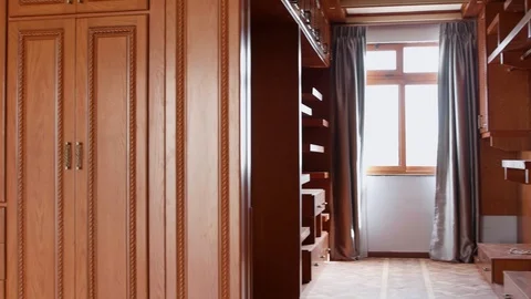 Nicely done wide modern dressing room with drawers and closet Stock Footage 97261193