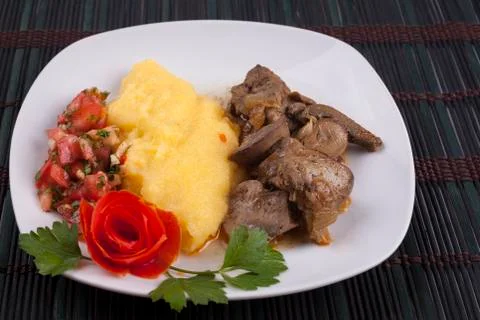 Nicely served polenta Stock Photos