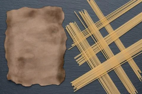 Nicely spread pasta and spaghetti. Aged paper sheet. Can be used for menus. Stock Photos