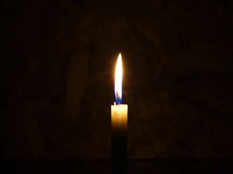 Nick of time by candlelight in the darkness Stock Footage 82304698