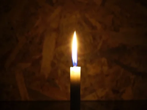 Nick of time by candlelight in the darkness Stock Footage 82304713