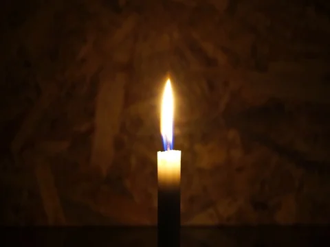 Nick of time by candlelight in the darkness Stock Footage 82304776