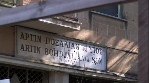 Nicosia Green Line Buffer Zone - abandoned Ledra Street shop sign Stock Footage 61393786