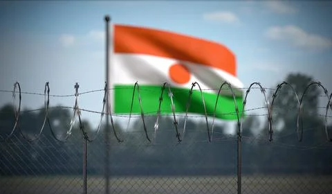 Niger - Flag and Barbed Wire Fence - 3D illustration Stock Illustration