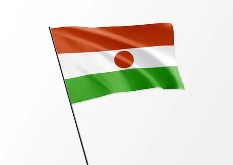 Niger flag flying high in the isolated background Niger independence day. 3D Stock Illustration