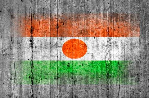 Niger flag painted on background texture gray concrete Stock Photos
