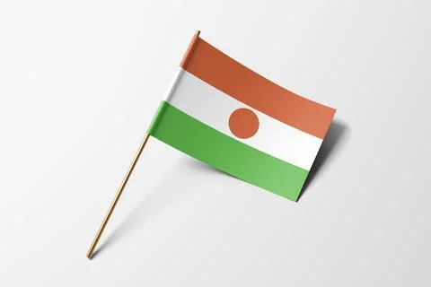 Niger flag of small paper, isolated on white background Stock Photos