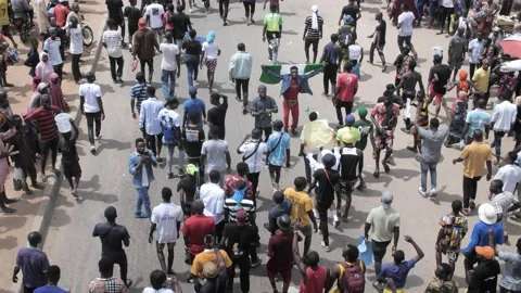 Nigerians protest against police brutality and dissolution of sars in Nigeria Stock Footage