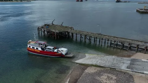 Nigg Pier and Cromarty to Nigg ferry drone aerial clip Stock Footage 247347161