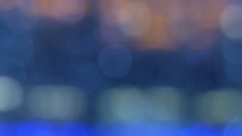 Night abstract background is defocused with nice bokeh. Blurred Christmas Lig Stock Footage 82836024