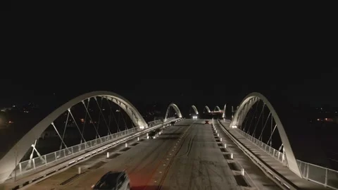 Night aerial along the deck of the Sixth Street Viaduct, Los Angeles Stock Footage 339303470
