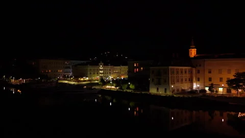 Night aerial arc shot over Gmunden waterfront, Austria Vídeos de archivo 331215071