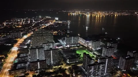 Night Aerial Cityscape George Town Traffic and Waterfront Stock Footage 332234341
